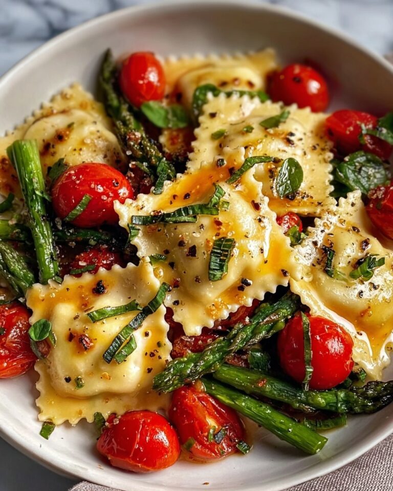 Ravioli with Cherry Tomatoes, Asparagus, Garlic, and Herbs Recipe
